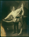 Female dancer being partnered in high extension